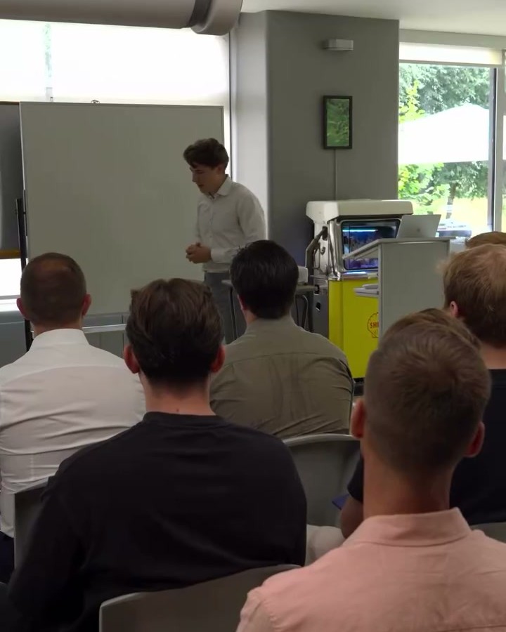 Klaas teaching a room of community members